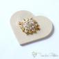 Preview: Beautiful heart-shaped light beige leatherette patch with golden flower with 19 zirkonia in pavé