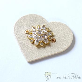 Beautiful heart-shaped light beige leatherette patch with golden flower with 19 zirkonia in pavé