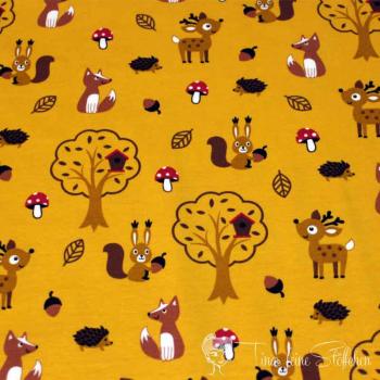 0,5 meter cotton jersey ochre with cute animals from the woods