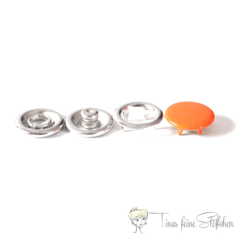 Set of 10 closed 11mm Jersey snaps in orange colour