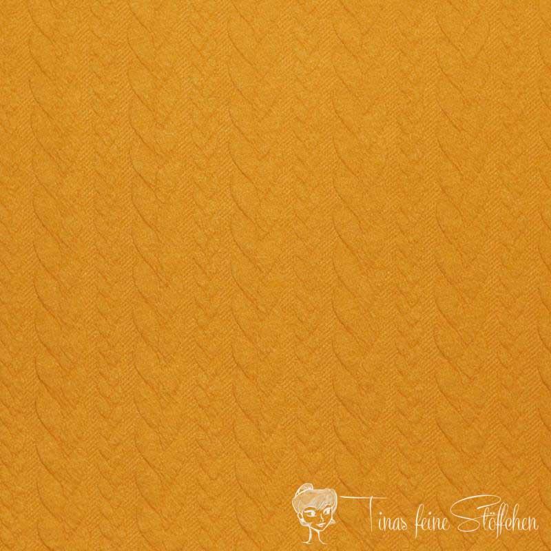 0,5 meter Jacquard knitted fabric with plait pattern ochre