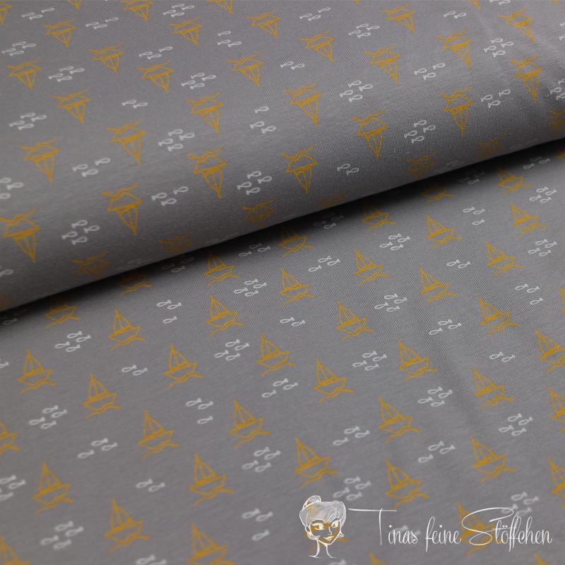 0,5 meter Cotton jersey grey with ochre sailing boats