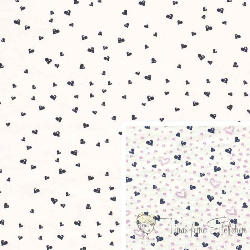 0.5 meter cotton jersey white UV-colorchange with black and pink hearts