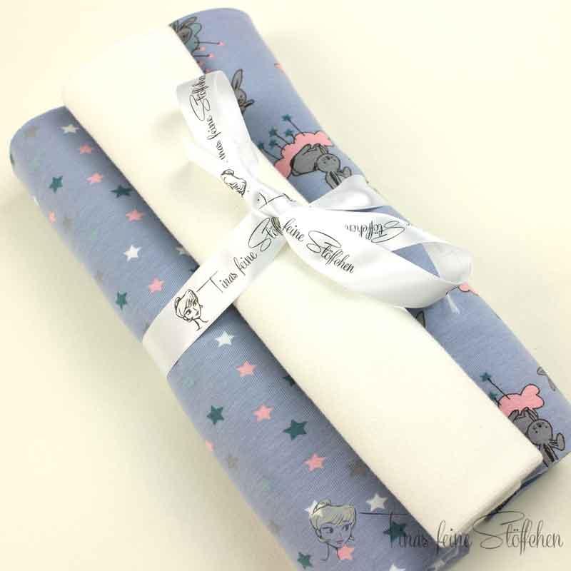 Fabric package with rabbits and clouds