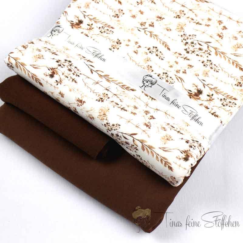 Fabric package dried flowers in light brown