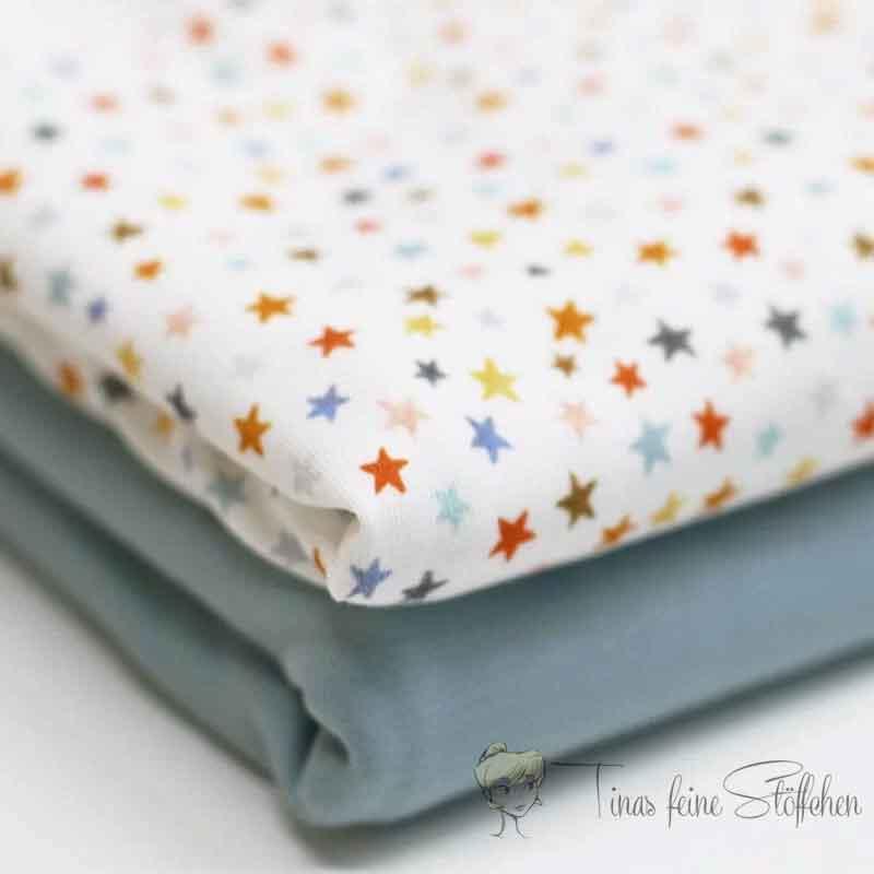 Fabric package with colorful stars